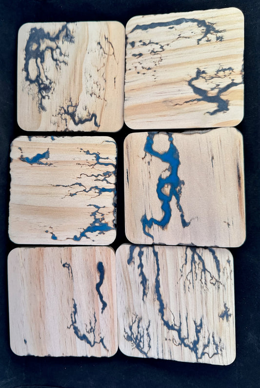 Wooden fractal burning coasters